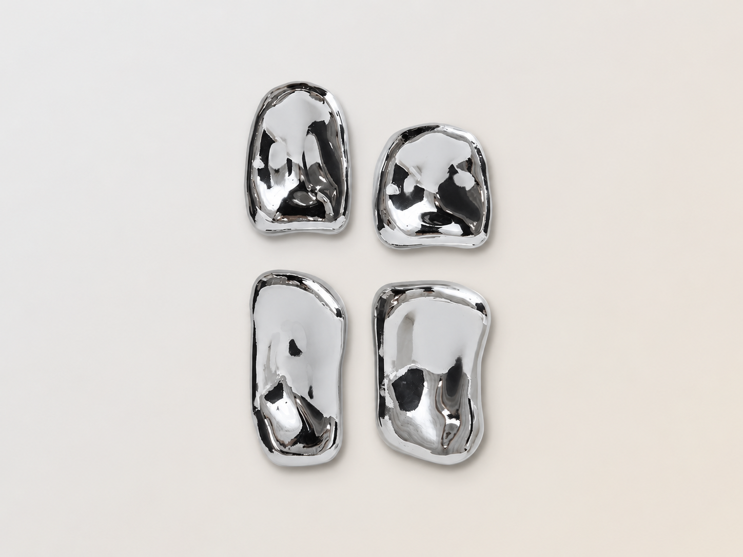 Glass sculpture, chrome, set of 4